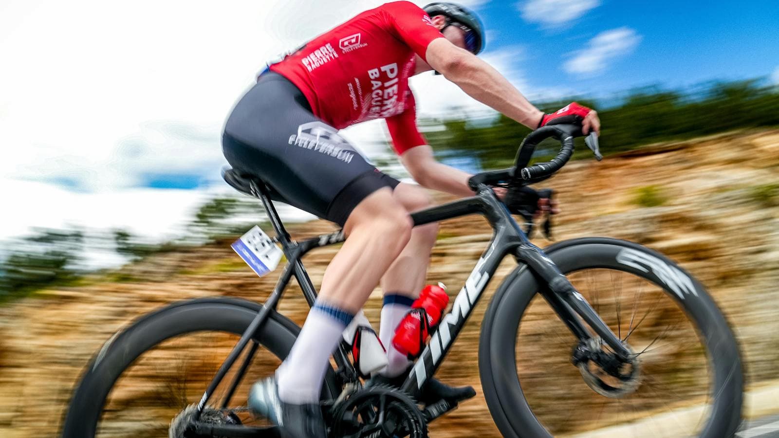 road cyclist maintaining aerodynamic position and steady cadence to enhance efficiency