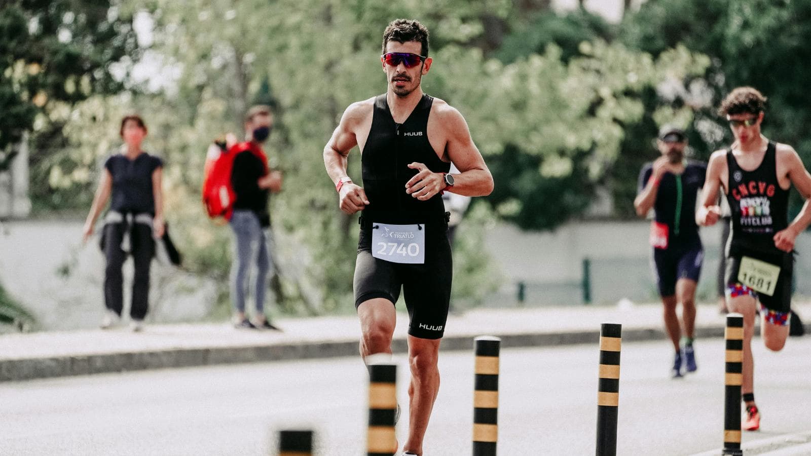 triathlete struggling during run after poor pacing on swim and bike segments