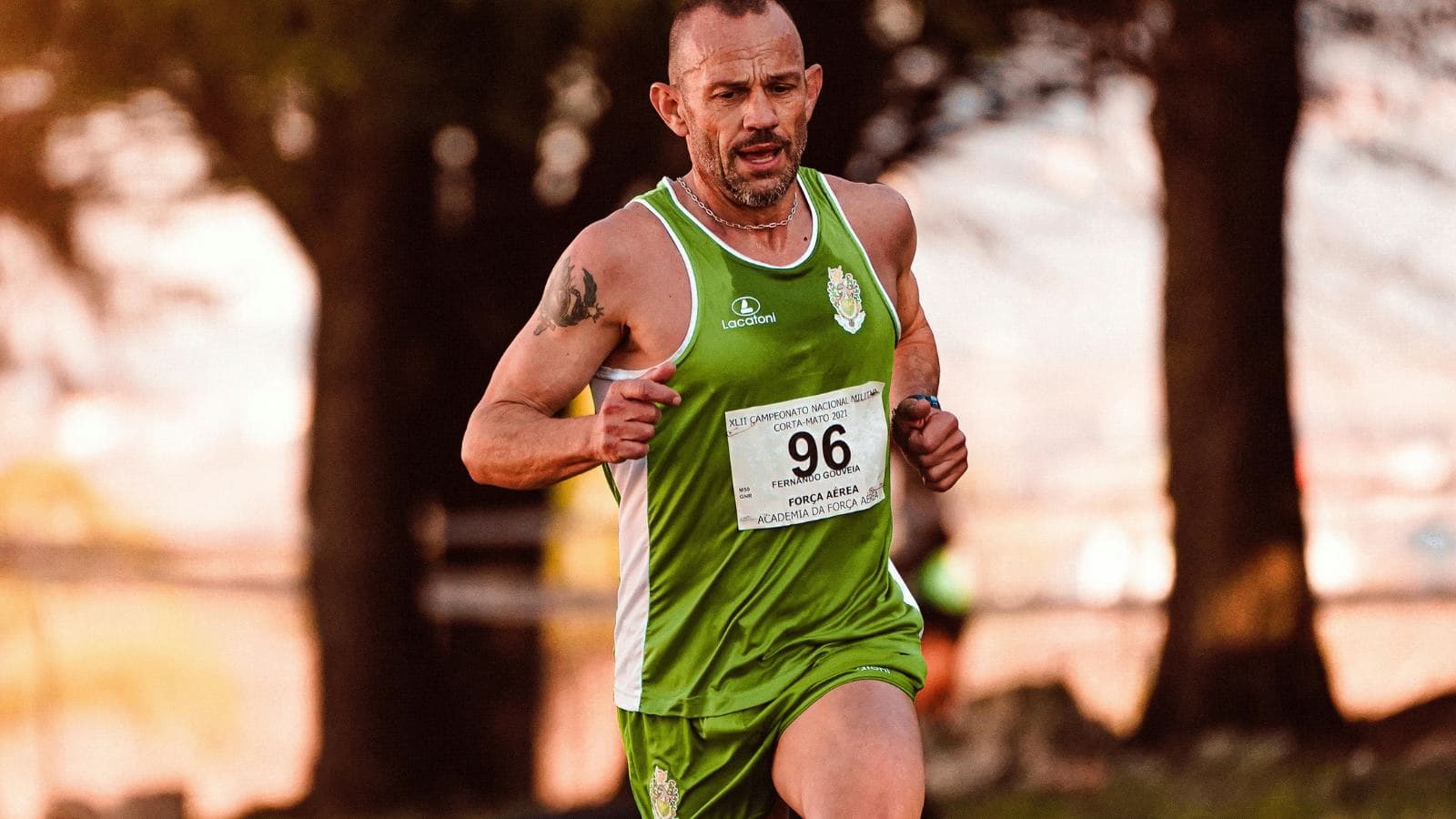 triathlete performing running drills to improve stride efficiency and race performance