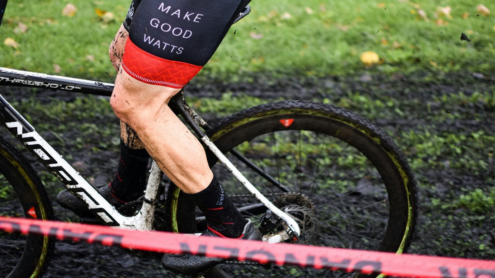 triathlete adjusting bike position to reduce knee pain and improve cycling comfort