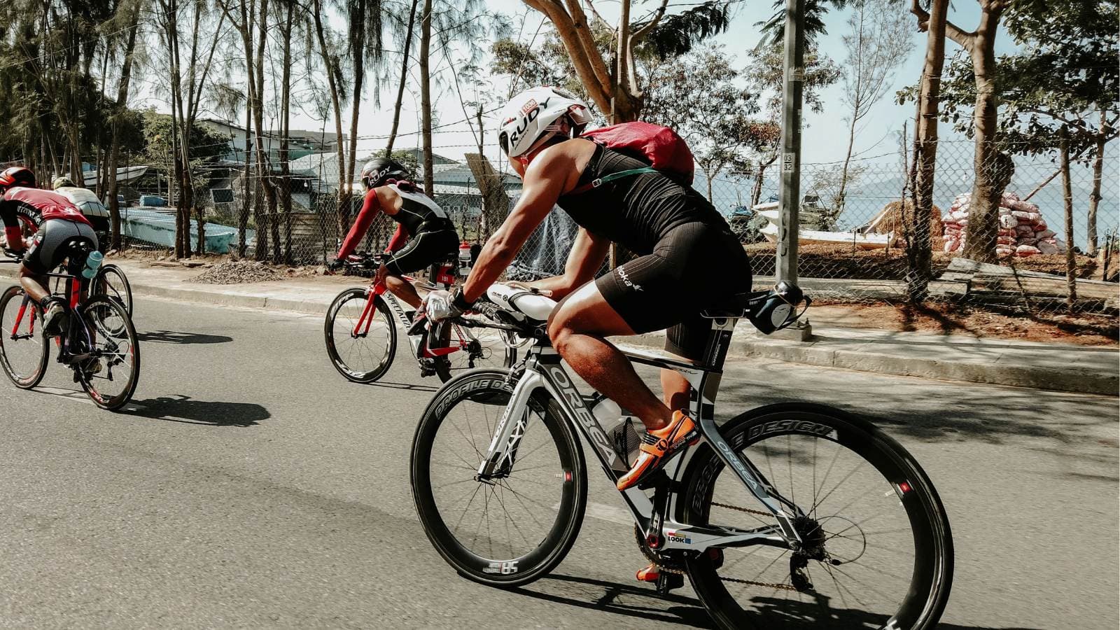cyclist performing power training workout while balancing recovery to avoid burnout and overtraining