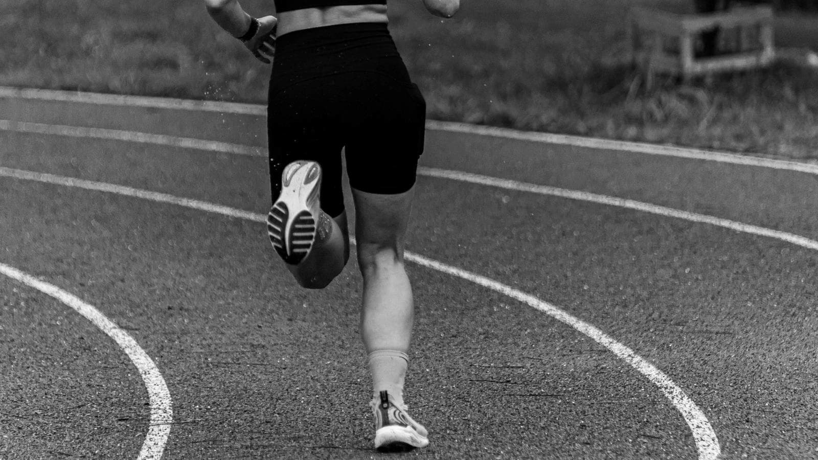 triathlete doing bike to run transition workout to improve running efficiency and race performance
