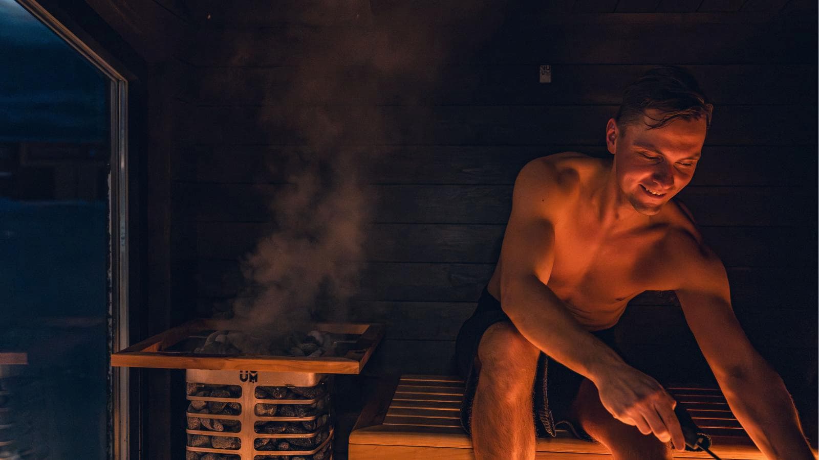 triathlete using sauna after training session to support heat acclimation and recovery safely