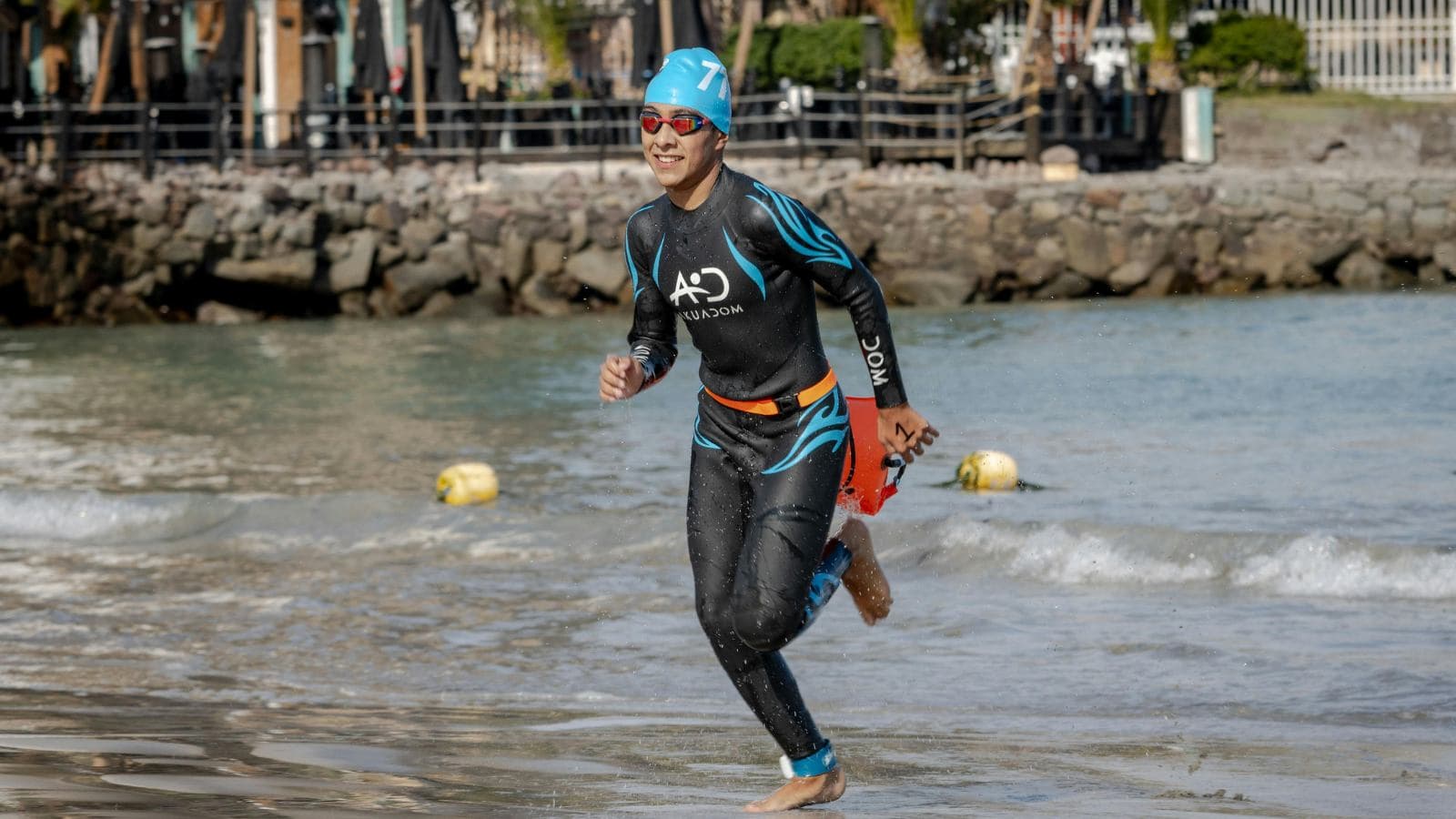 new triathlete learning swimming cycling and running as part of beginner training program