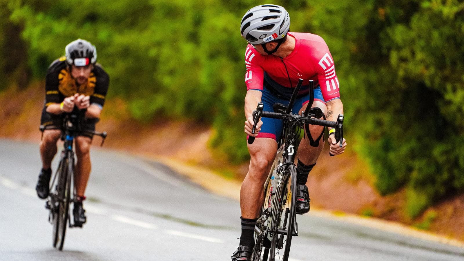 triathlete stretching hip flexors after cycling to improve hip extension and running performance during triathlon training