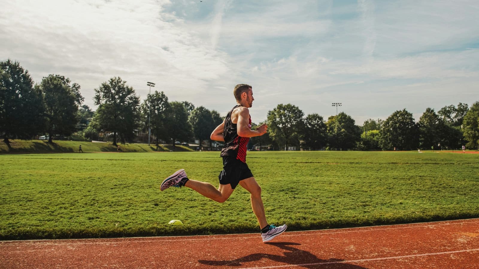 elite triathlete running fast after cycling during race with efficient bike to run transition