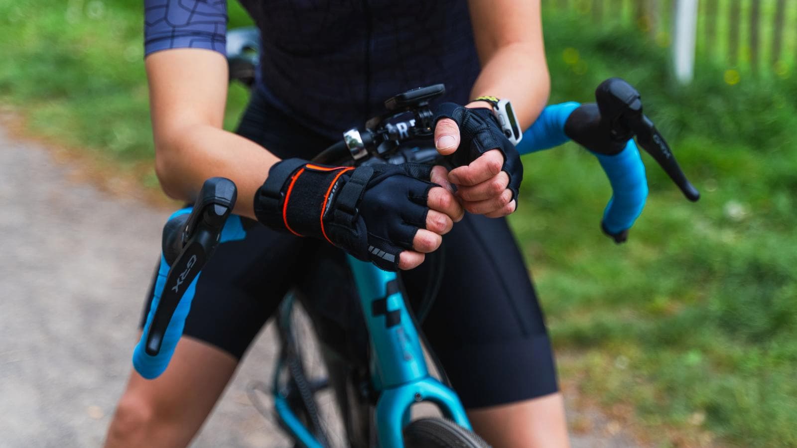 triathlete experiencing hand numbness and wrist discomfort while cycling due to carpal tunnel syndrome
