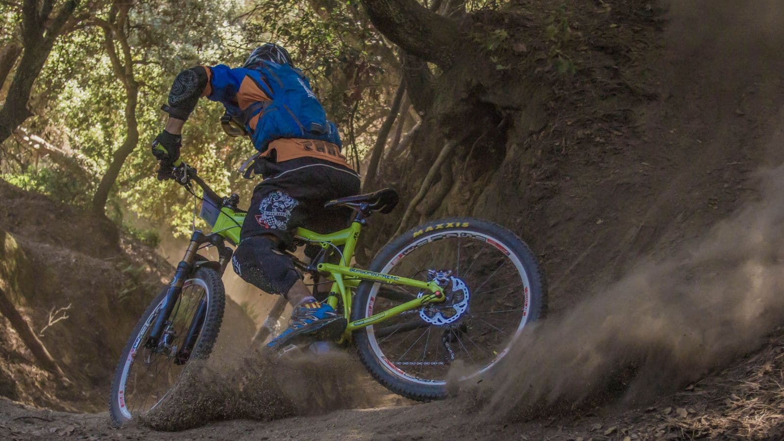 beginner triathlete practicing mountain biking skills on off road trail to improve bike handling