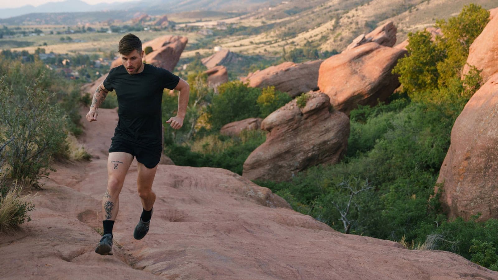 triathlete completing technique drills in running track during off season endurance training