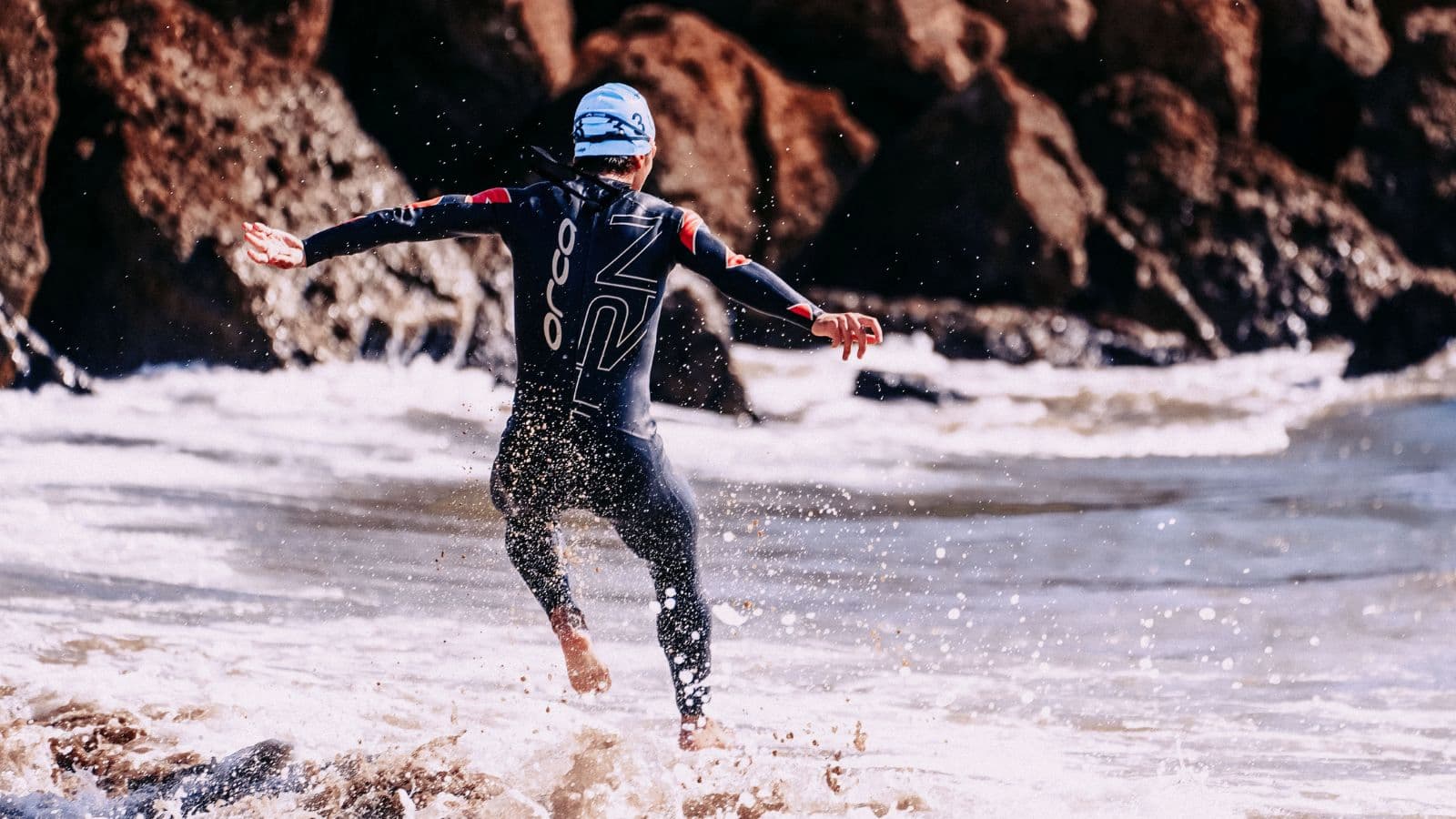 triathlete feeling dizzy during T1 transition after exiting open water swim in a race
