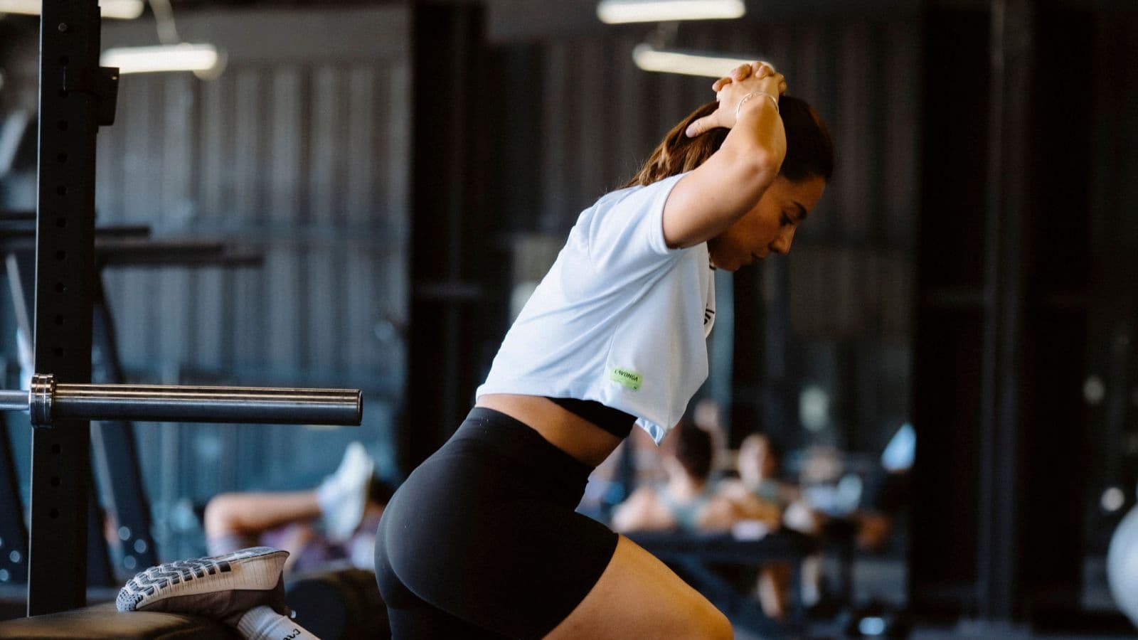 Runner staying focused while completing rehabilitation exercises during recovery from a running injury.