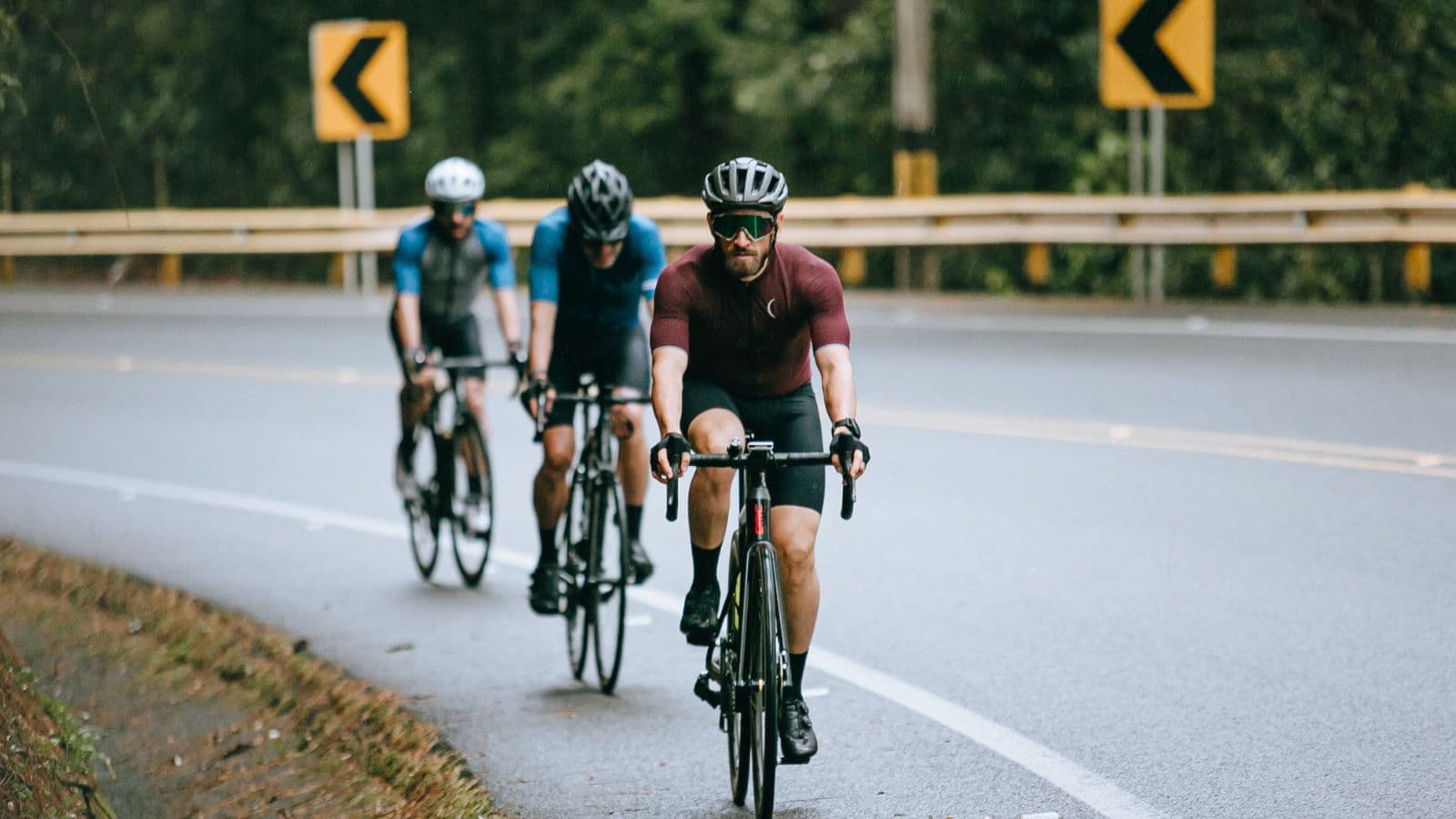 Triathlete completing structured cycling intervals while monitoring heart rate to maintain the target training zone.