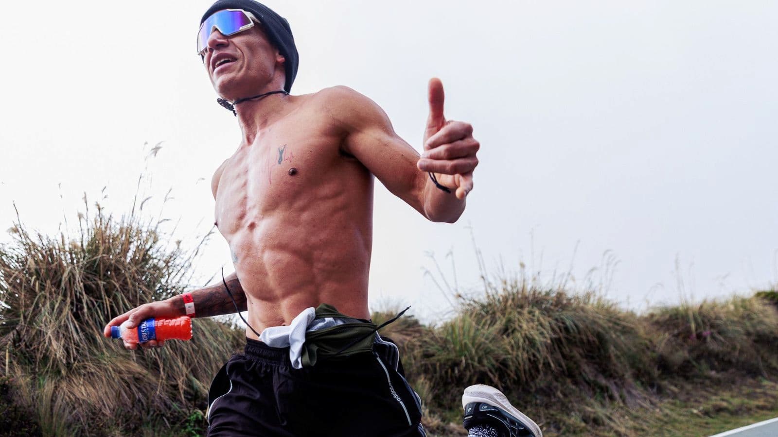 beginner triathlete organizing swim bike and run gear before first triathlon race