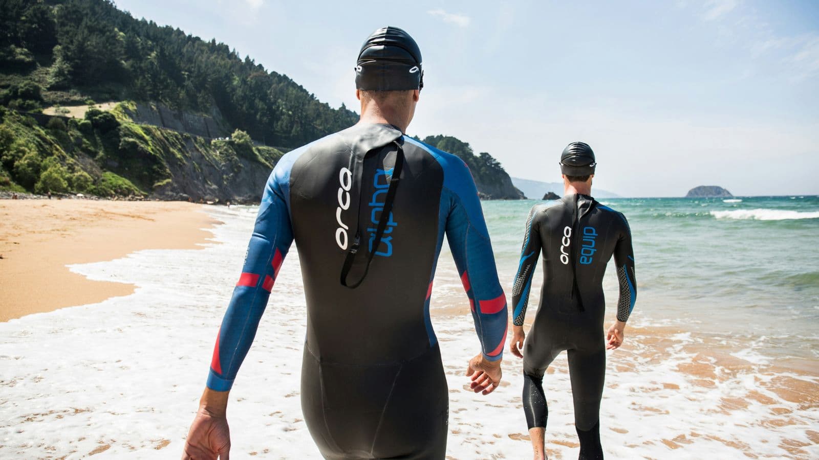 triathlete waiting at open water swim start while managing pre race nerves before triathlon
