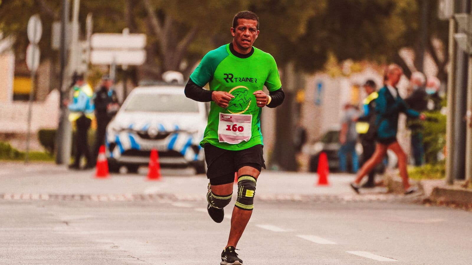 Triathlete logging weekly running mileage progression as per training calendar
