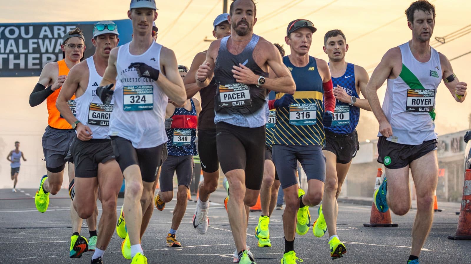Triathlete performing cadence drills during a training run to improve stride efficiency and reduce energy expenditure.