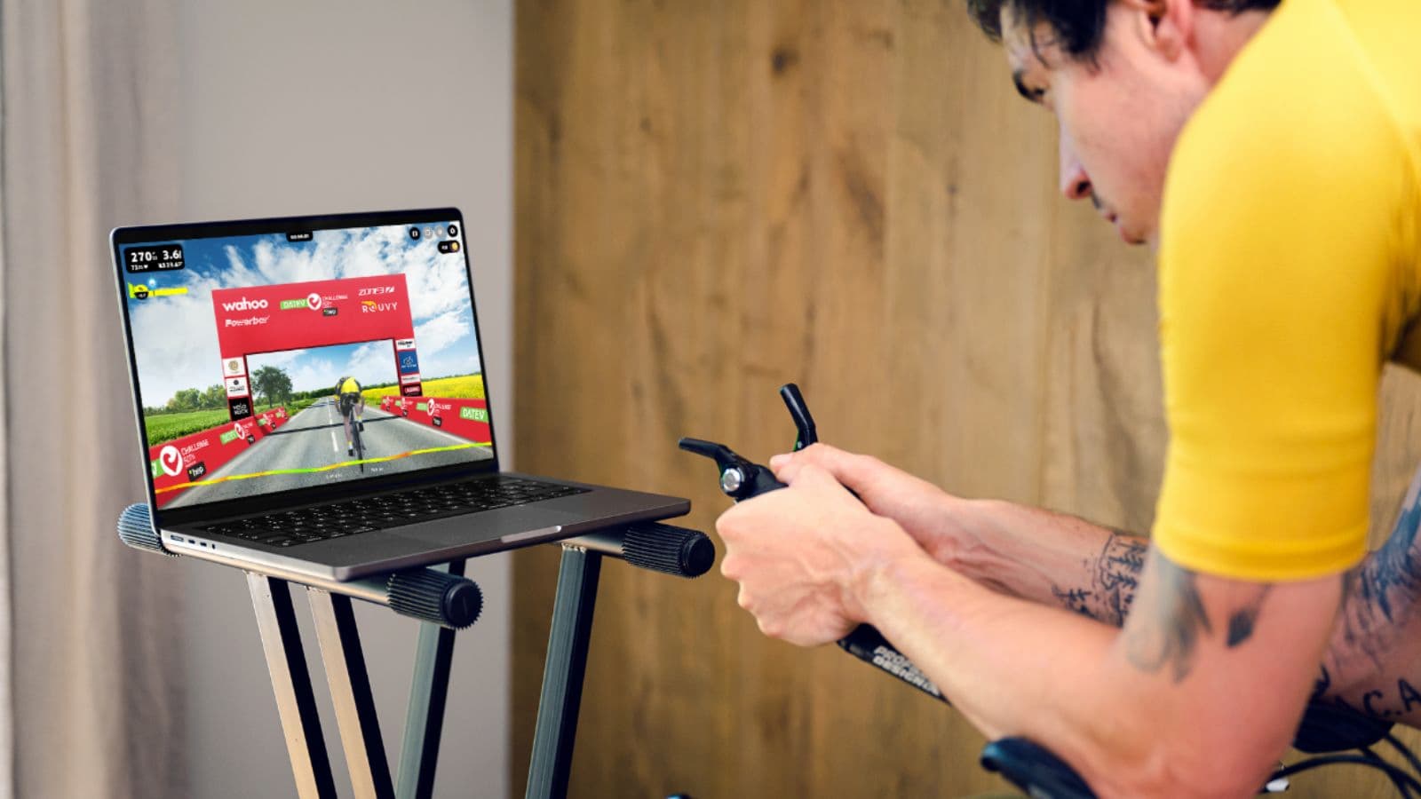 cyclist comparing indoor smart trainer workout with outdoor road cycling training