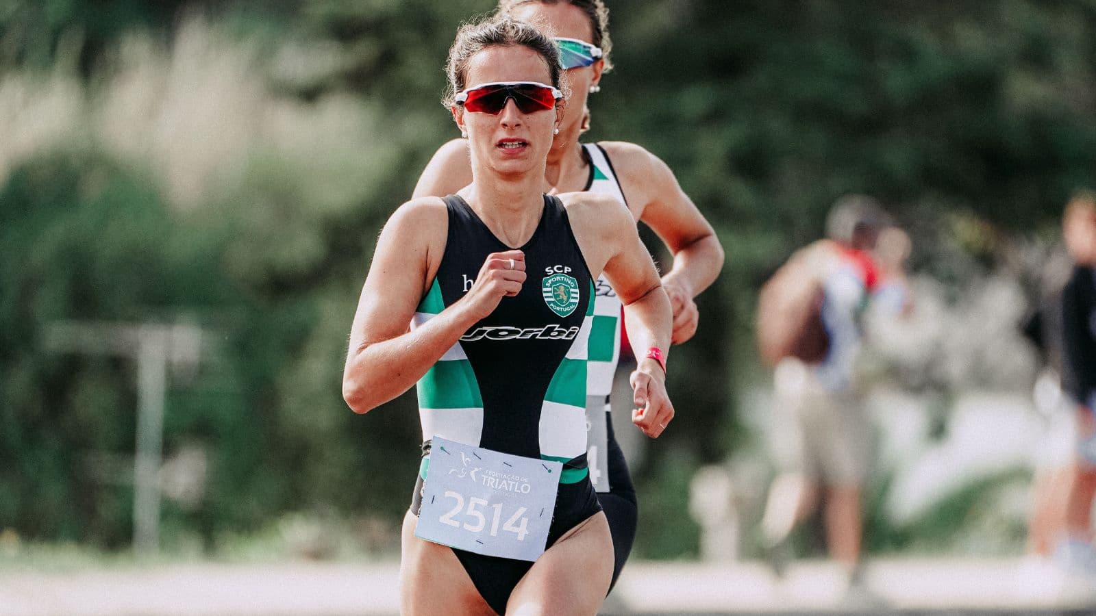 Long-distance runner maintaining a steady pace during endurance training to build stamina and avoid fatigue.