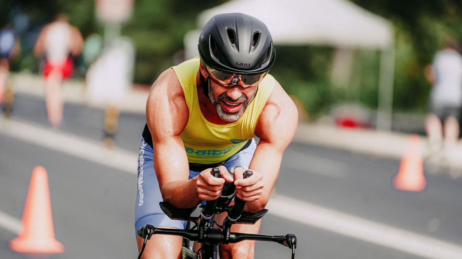 Cyclist maintaining a strong, sustained effort during a threshold interval training session