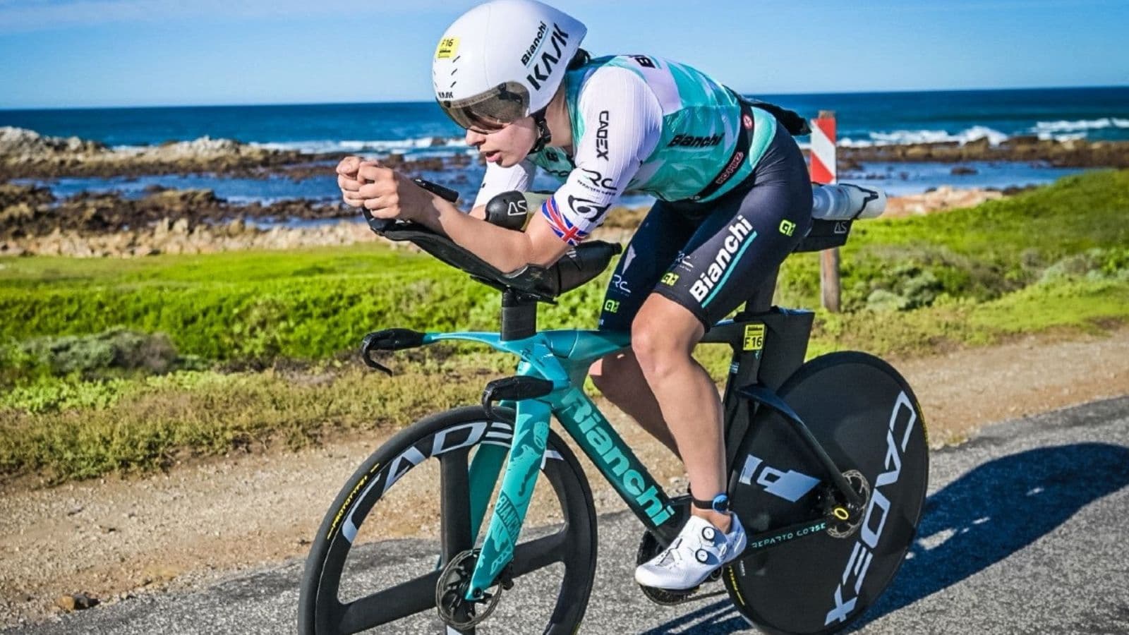 Triathlete maintaining an easy endurance pace during a long outdoor cycling session to develop aerobic fitness.
