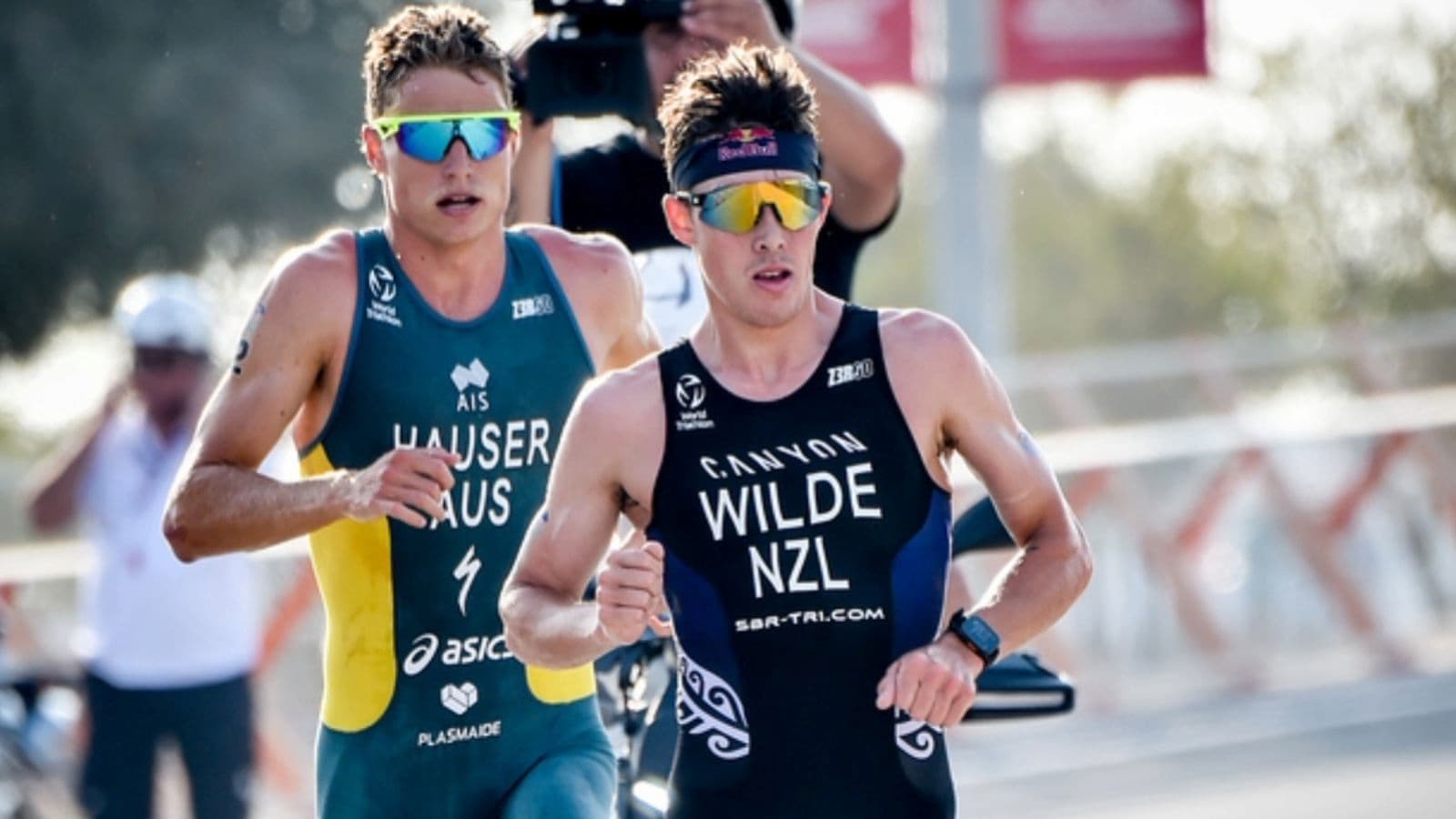 Triathlete starting the run leg with controlled form and pace after completing a well-paced cycling section.