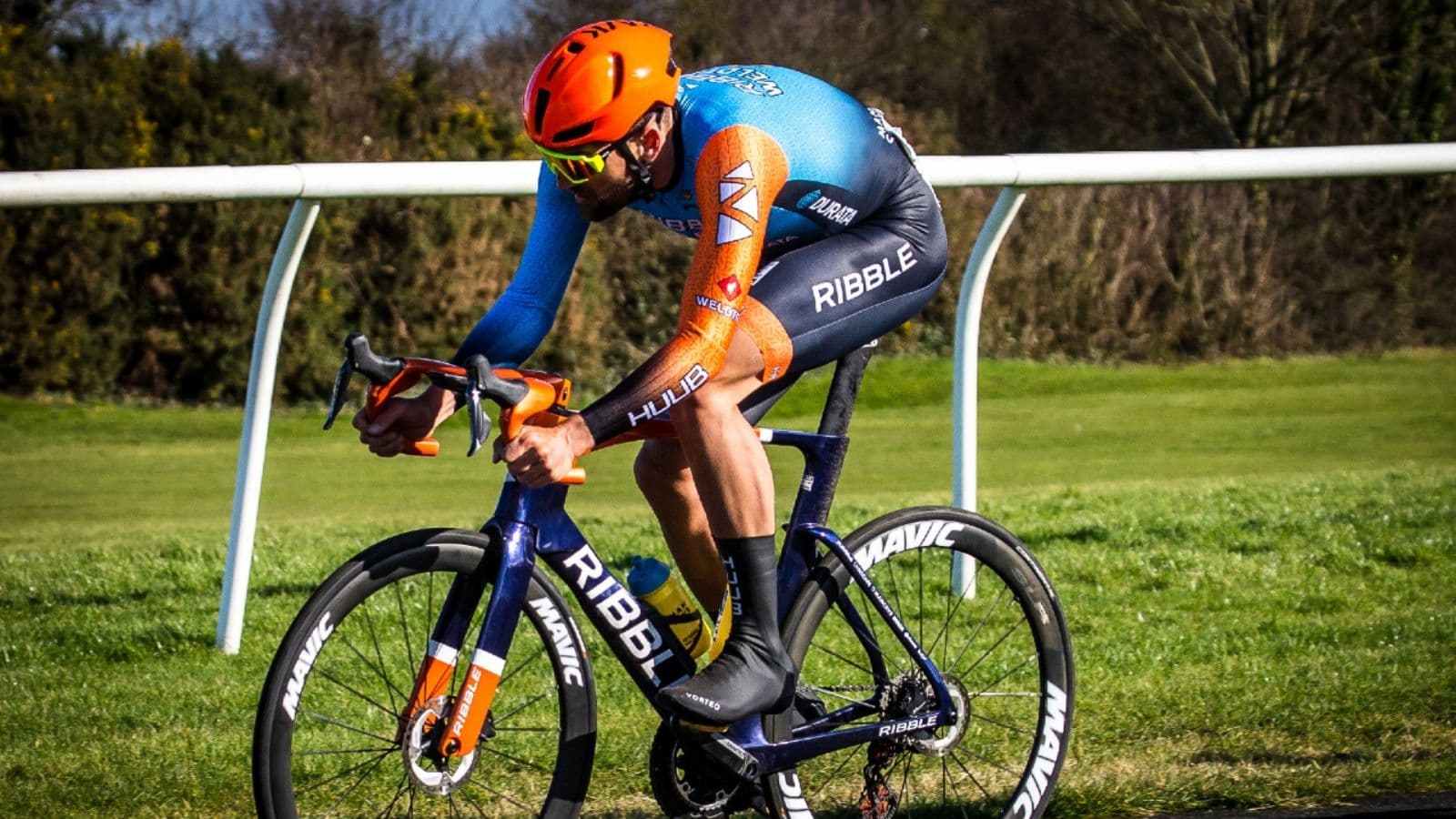 Cyclist resting after a demanding training block to reduce accumulated fatigue and support cycling performance improvements.
