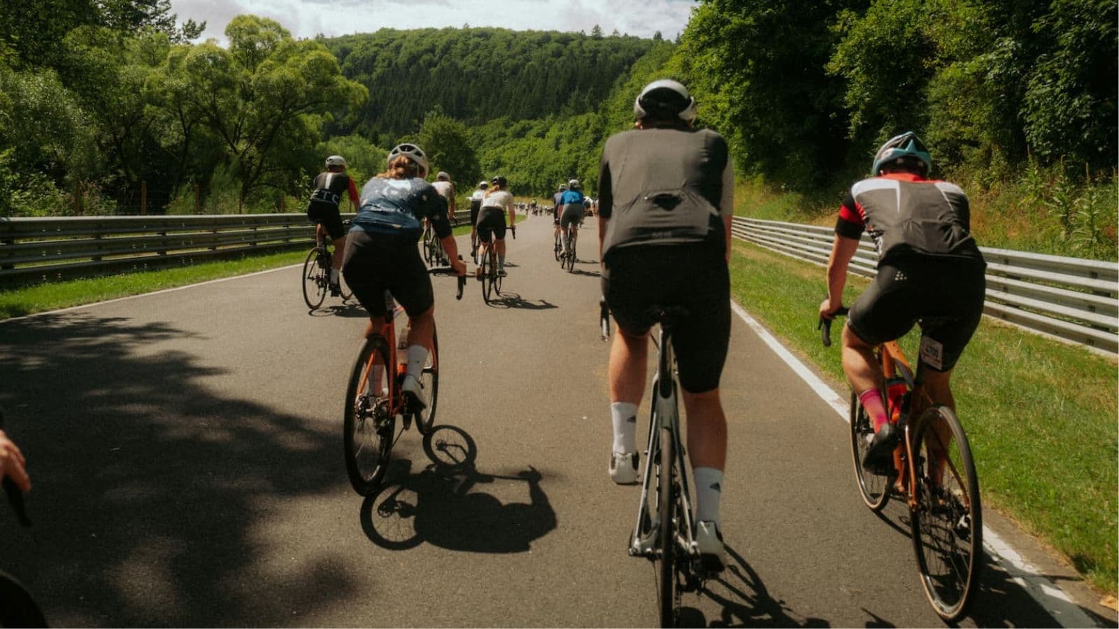 Beginner triathlete practicing cornering on a technical bike course to improve confidence, control, and handling skills.