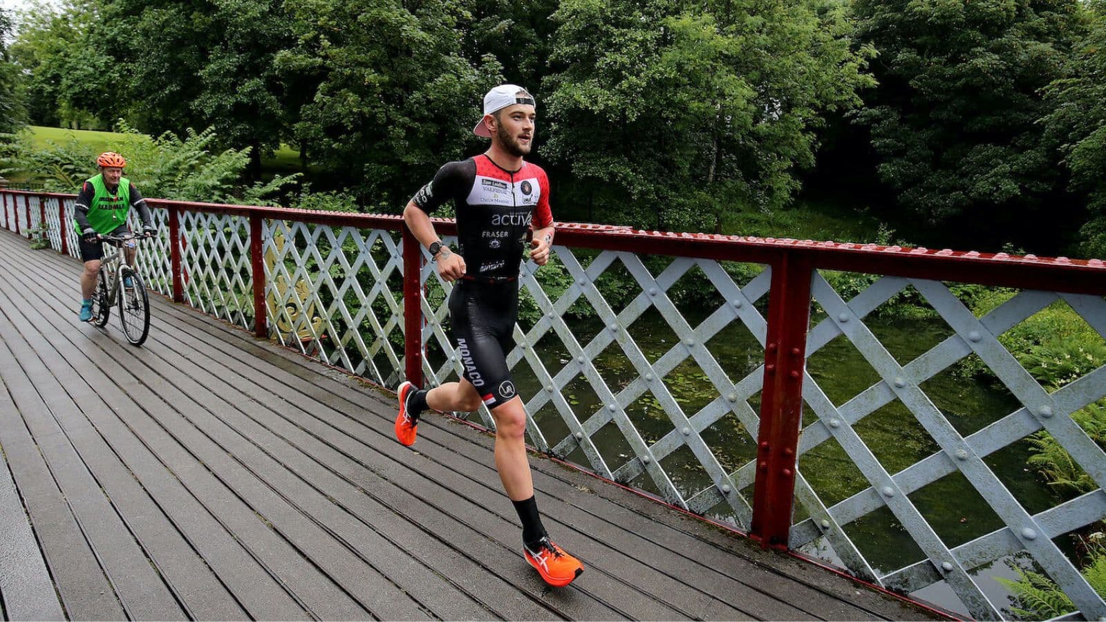 Triathlete maintaining an easy controlled pace during a long aerobic cycling session to build endurance for triathlon.