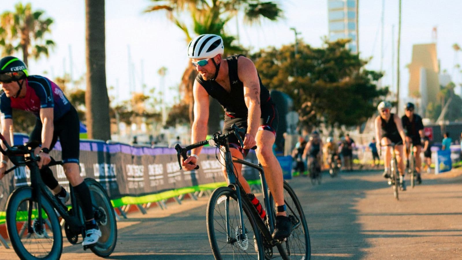 Triathlete completing a long endurance ride in the aero position while preparing for a half-Ironman or Ironman-distance race.