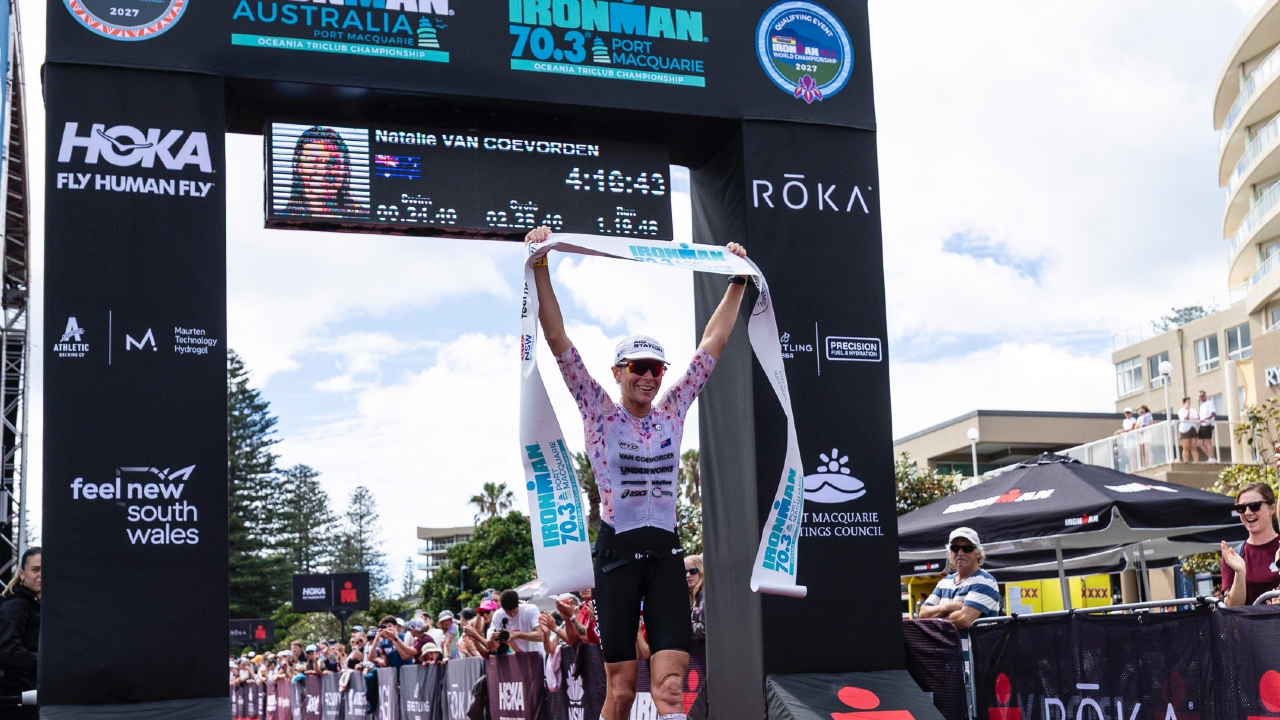 Natalie Van Coevorden finish line claiming the win at IRONMAN 70.3 Port Macquarie - Photo Korupt Vision