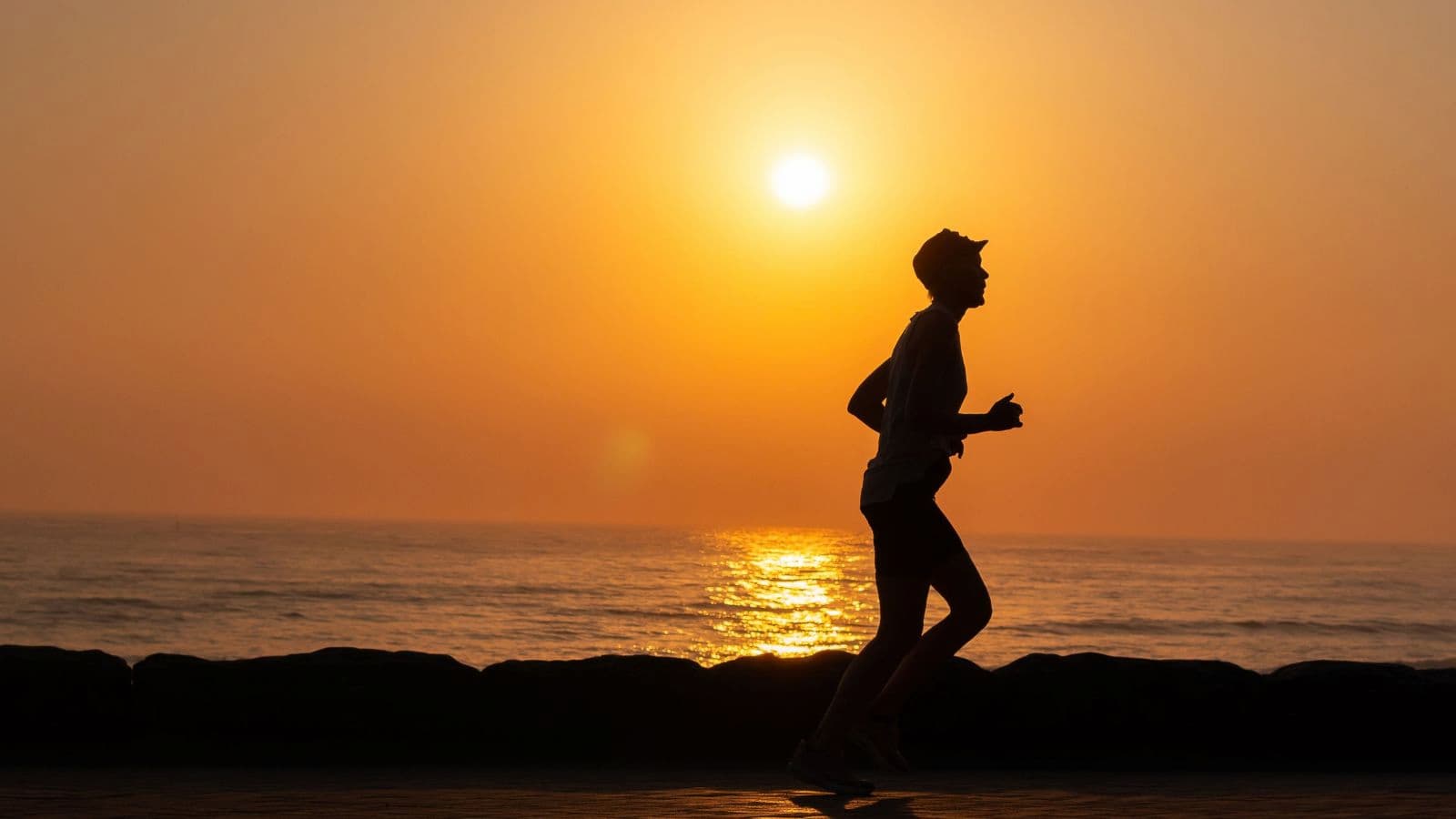 Triathlete completing an early morning training session while adapting to the time of day commonly used for triathlon racing.