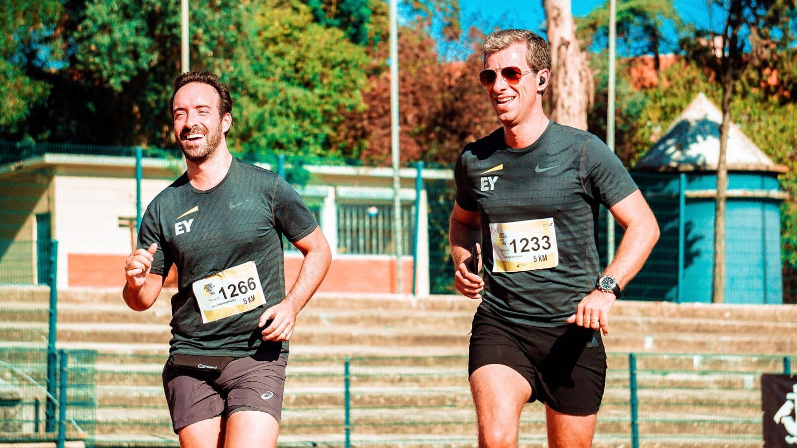 Triathlete running without headphones while focusing on breathing and maintaining a controlled training effort.